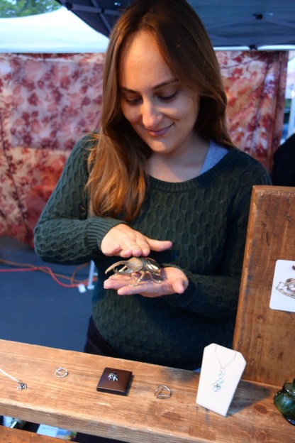 Jennifer  Autry  Bilogical Jewels Andrea petting her bug